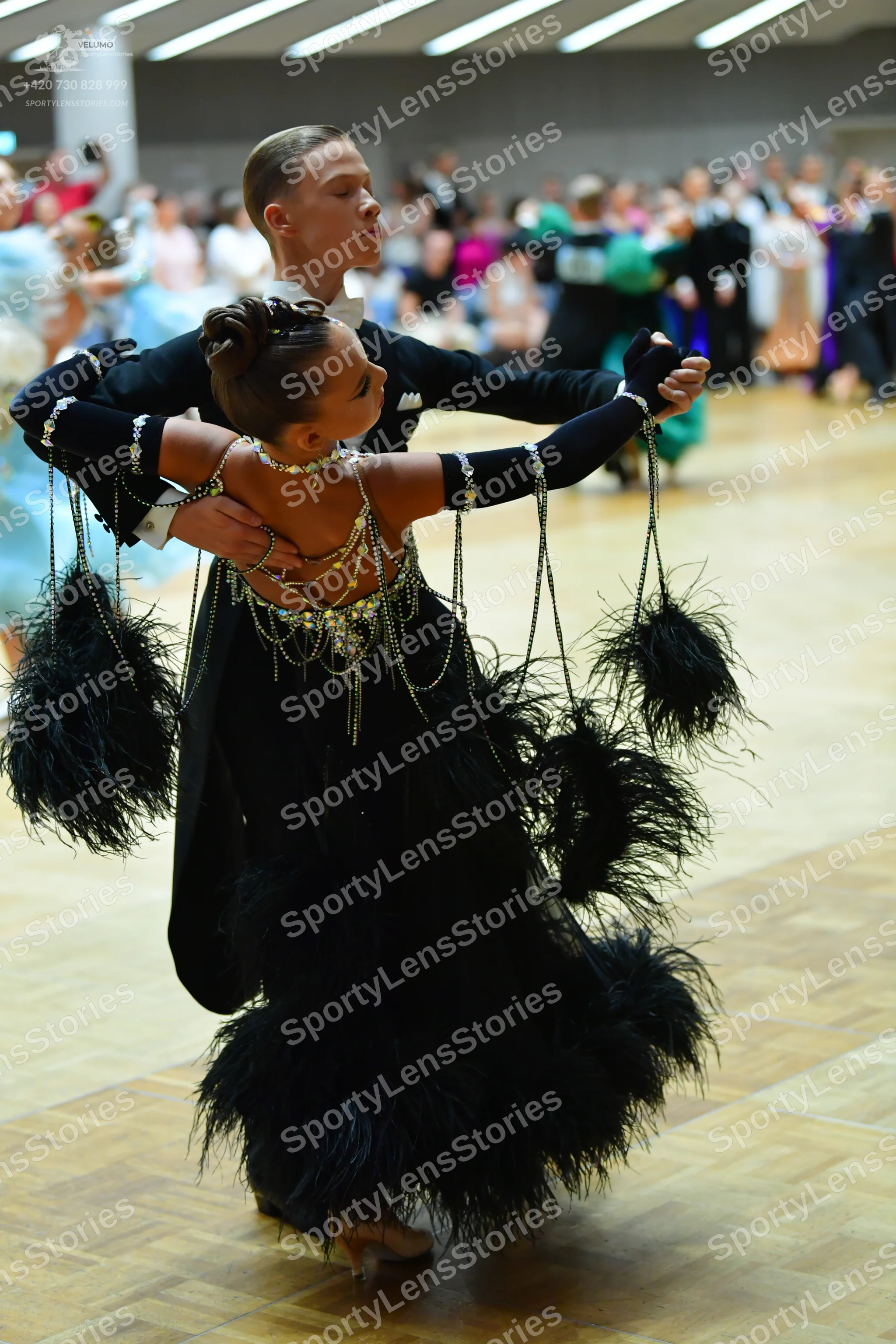 Dancesport competitor: Male dancer: black suit
