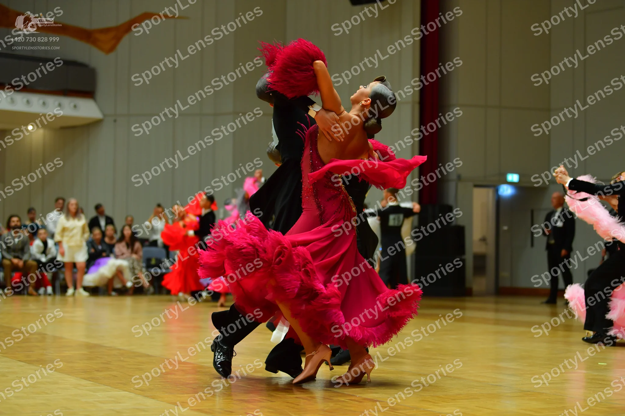 Dancesport competitor: Central male dancer: black suit
