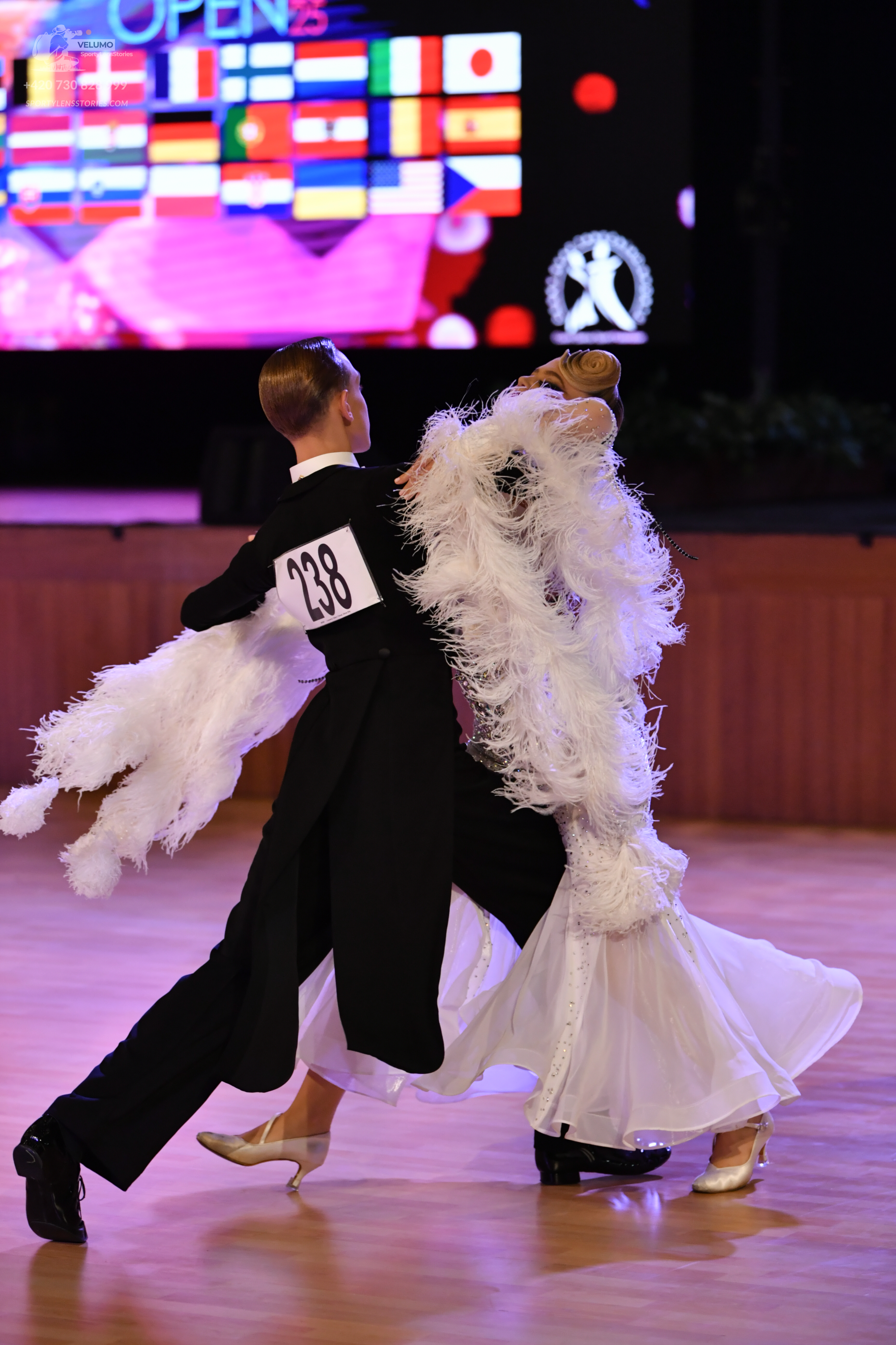 Dancesport competitor: ** Black tailsuit