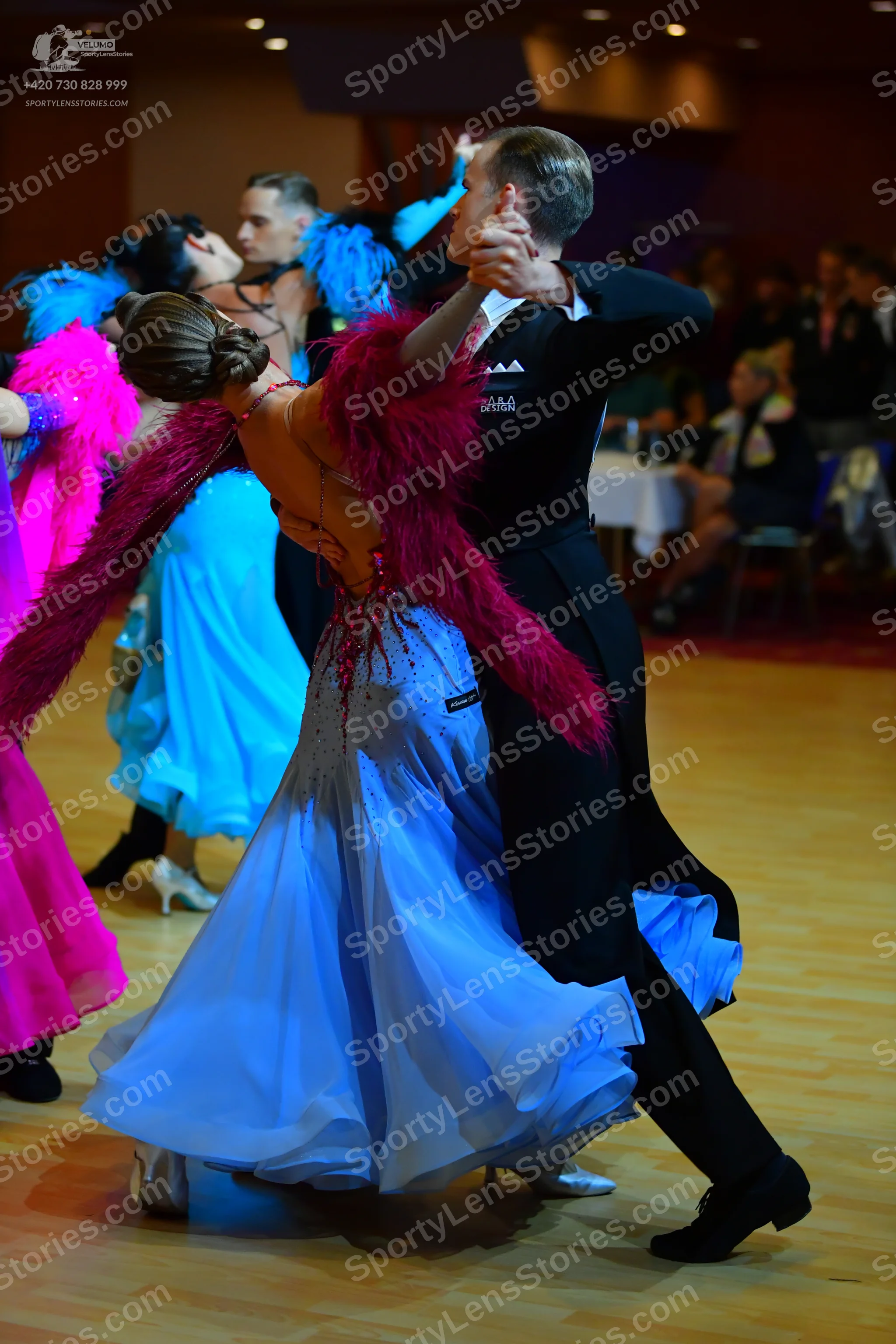 Dancesport competitor: Male dancer: black long-sleeve shirt and black trousers