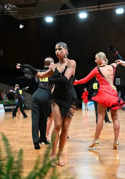 Dancesport competitor #51: Male dancer: black trousers and black shirt