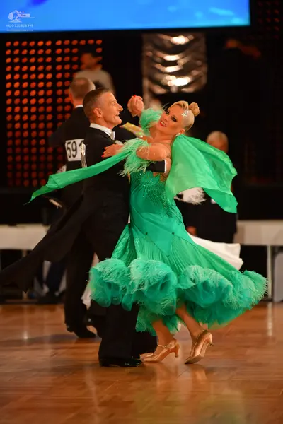 Dancesport competitor #59: Male dancer: black suit with a white shirt and black bowtie