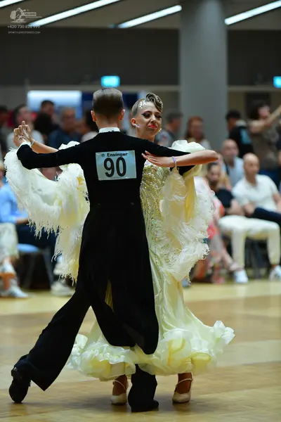 Dancesport competitor #90: Male dancer: black long-sleeved top and black trousers