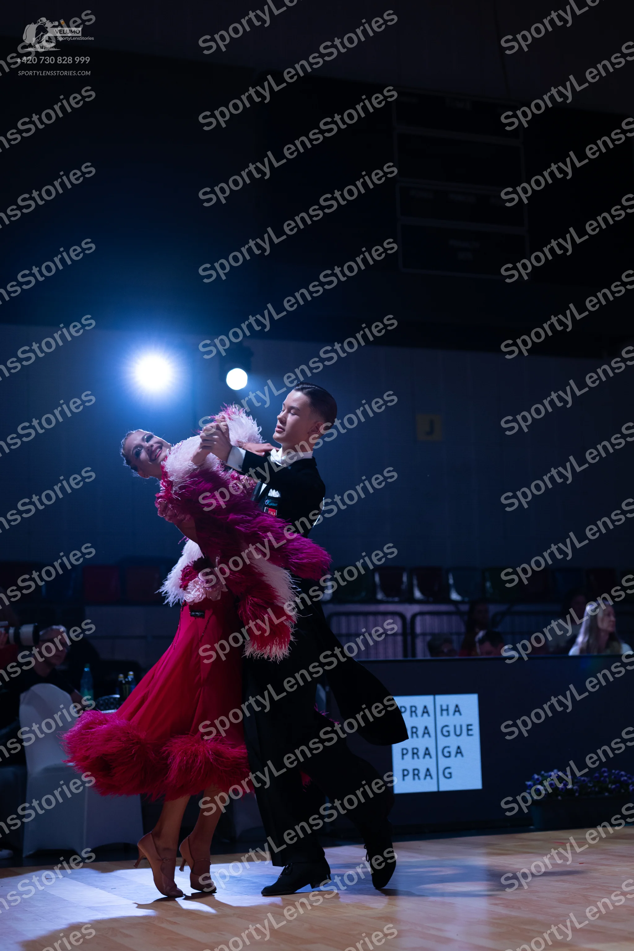 Dancesport competitor: Male dancer: black suit with a white shirt and black dance shoes