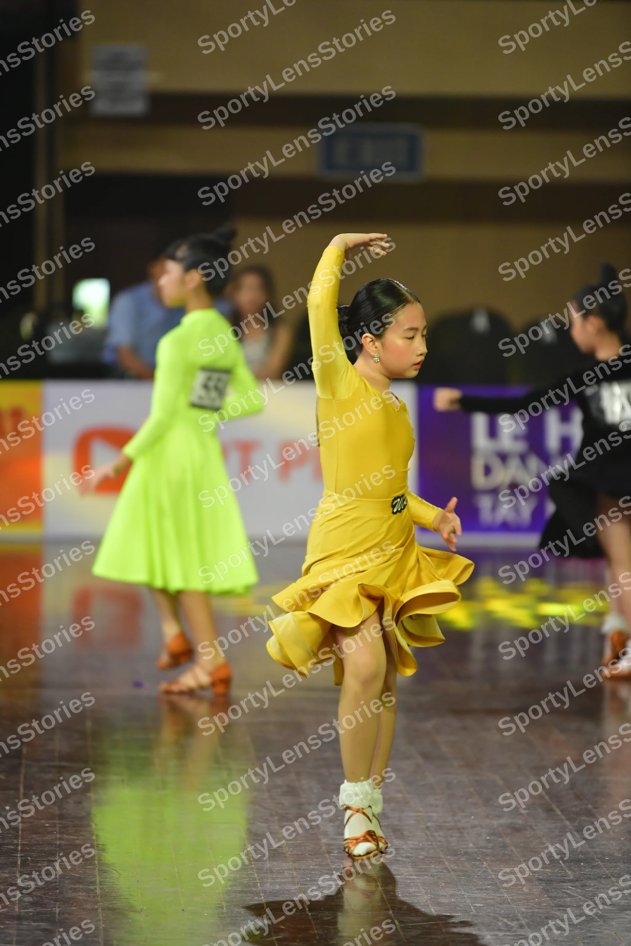 Dancesport competitor #451: Female dancer: lime green Latin dress