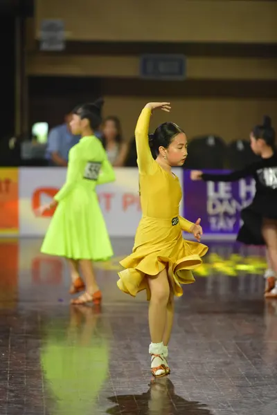 Dancesport competitor #451: Female dancer: lime green Latin dress