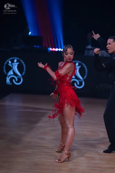 Dancesport competitor: Male dancer: black latin outfit