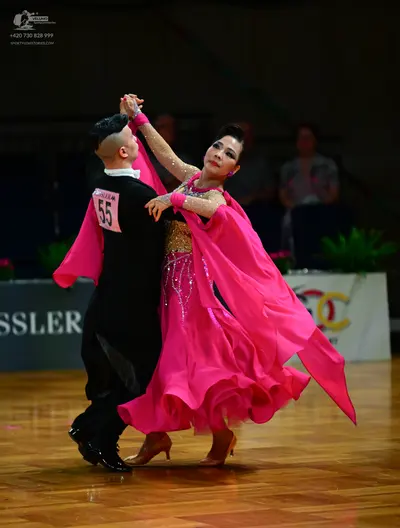 Dancesport competitor #55: Male dancer: black suit with a white shirt and black bowtie