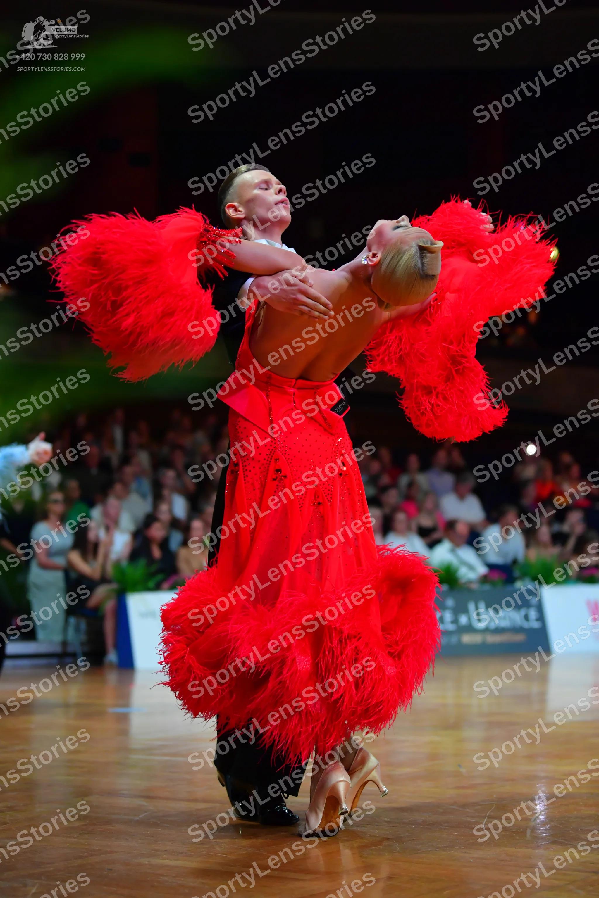 Dancesport competitor: Male dancer: black suit with a white shirt