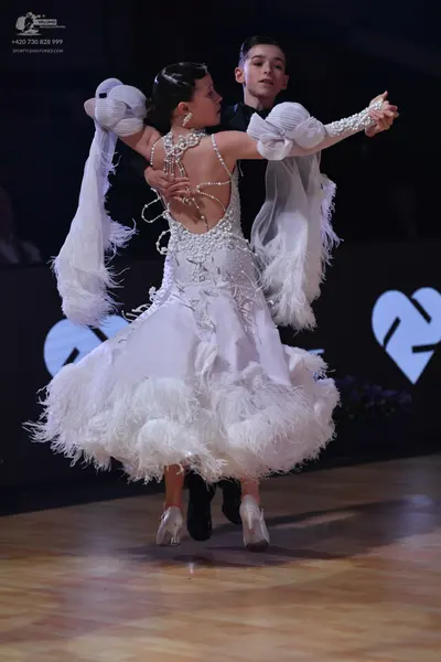 Dancesport competitor: Male dancer: black suit