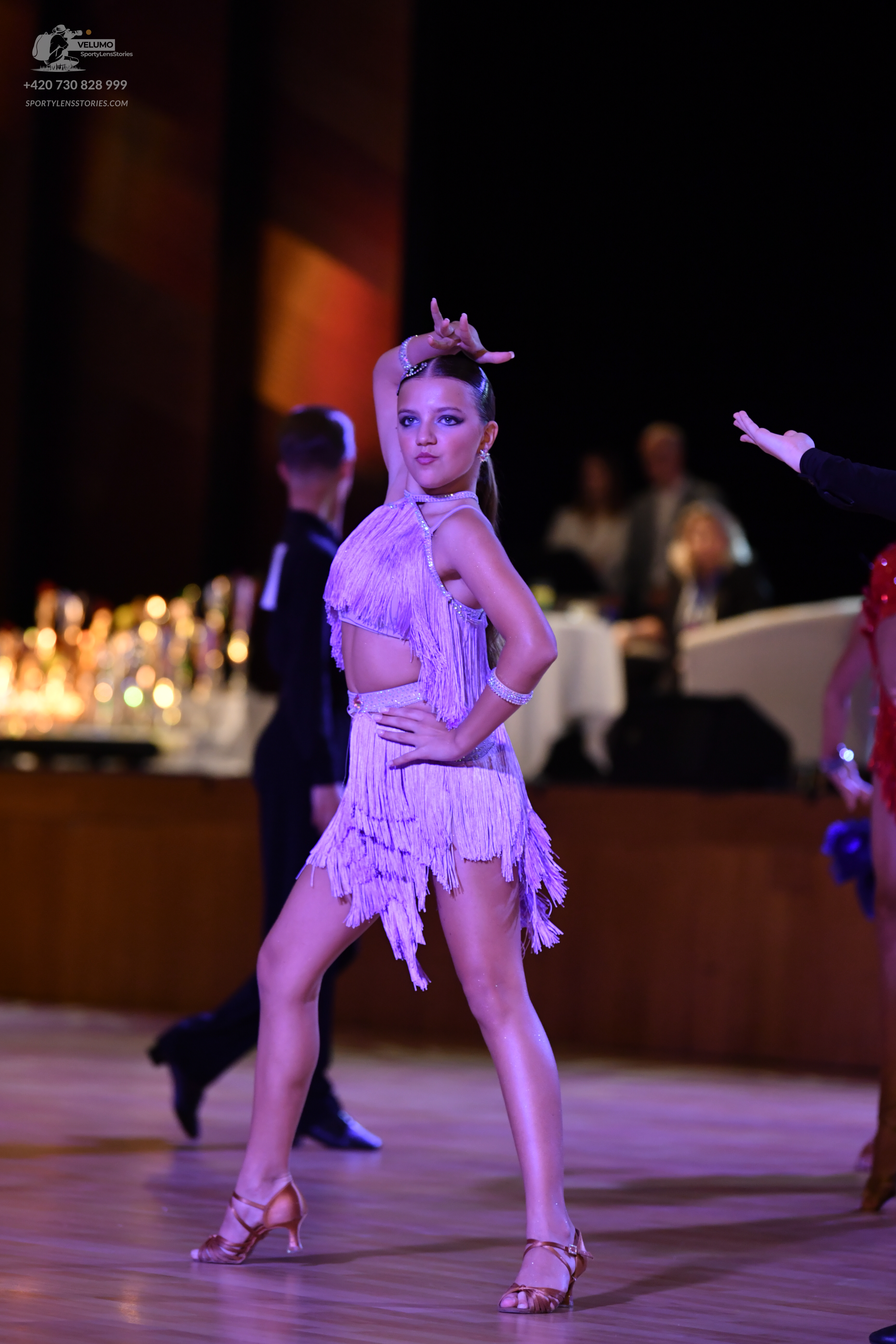 Dancesport competitor: ** Lavender (light purple) latin dress