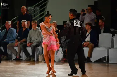 Dancesport competitor #60: Female dancer: pink Latin dress with lace and sequin embellishments