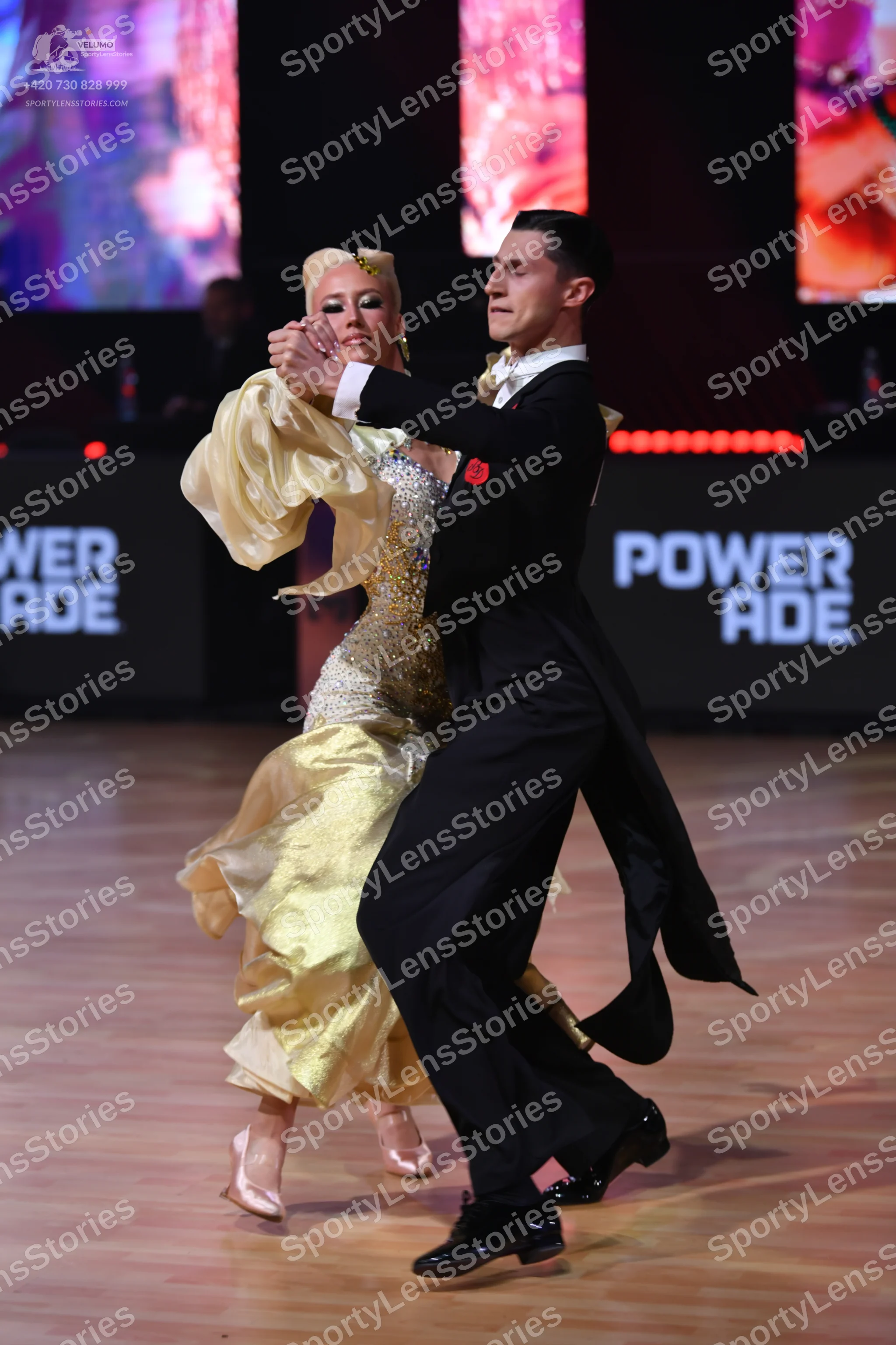 Dancesport competitor: Male dancer: black tailcoat with satin lapels, white shirt, black bowtie, black