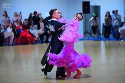 Dancesport competitor #207: Male dancer: black ballroom tailcoat with a white shirt