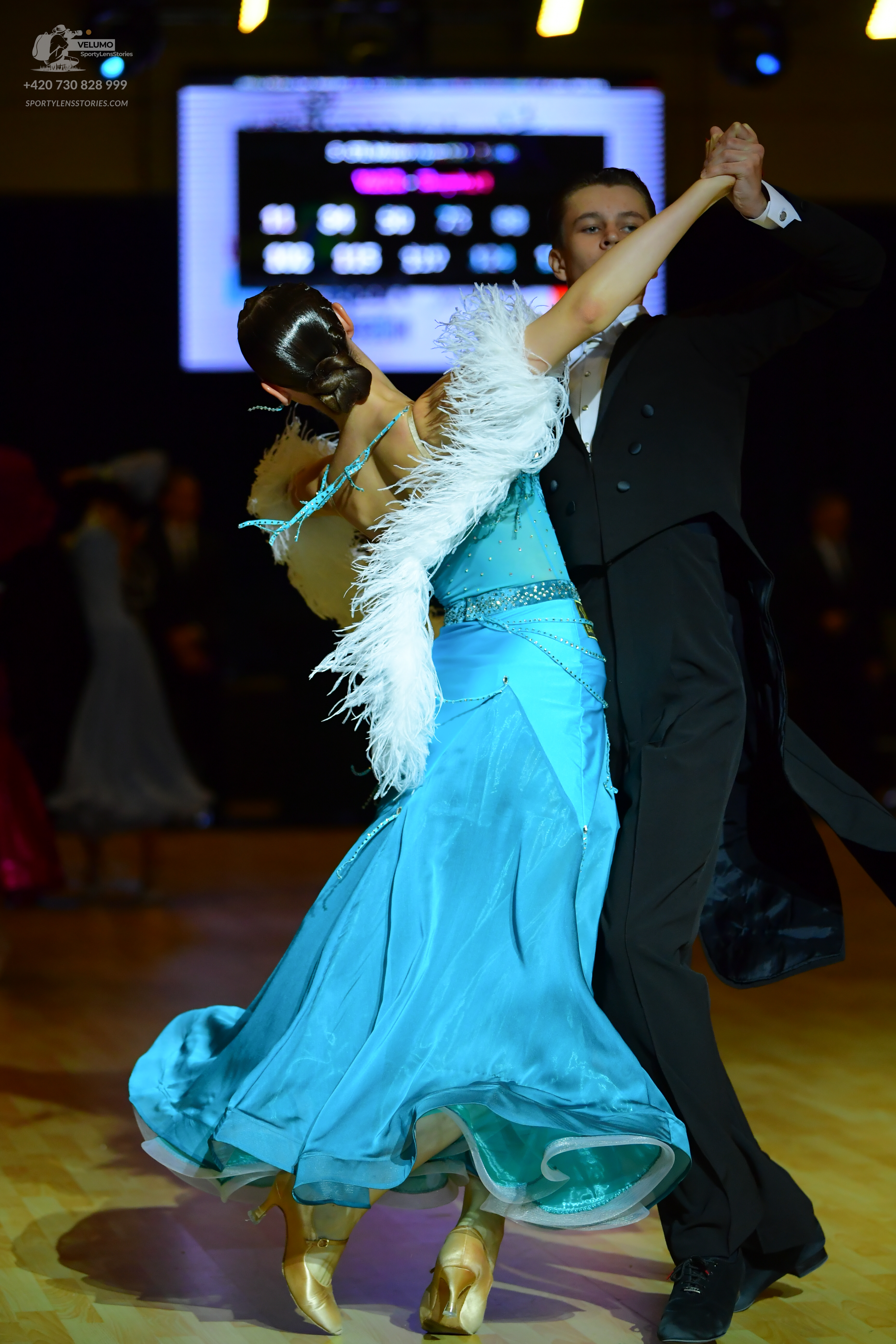 Dancesport competitor: Male dancer: black ballroom suit