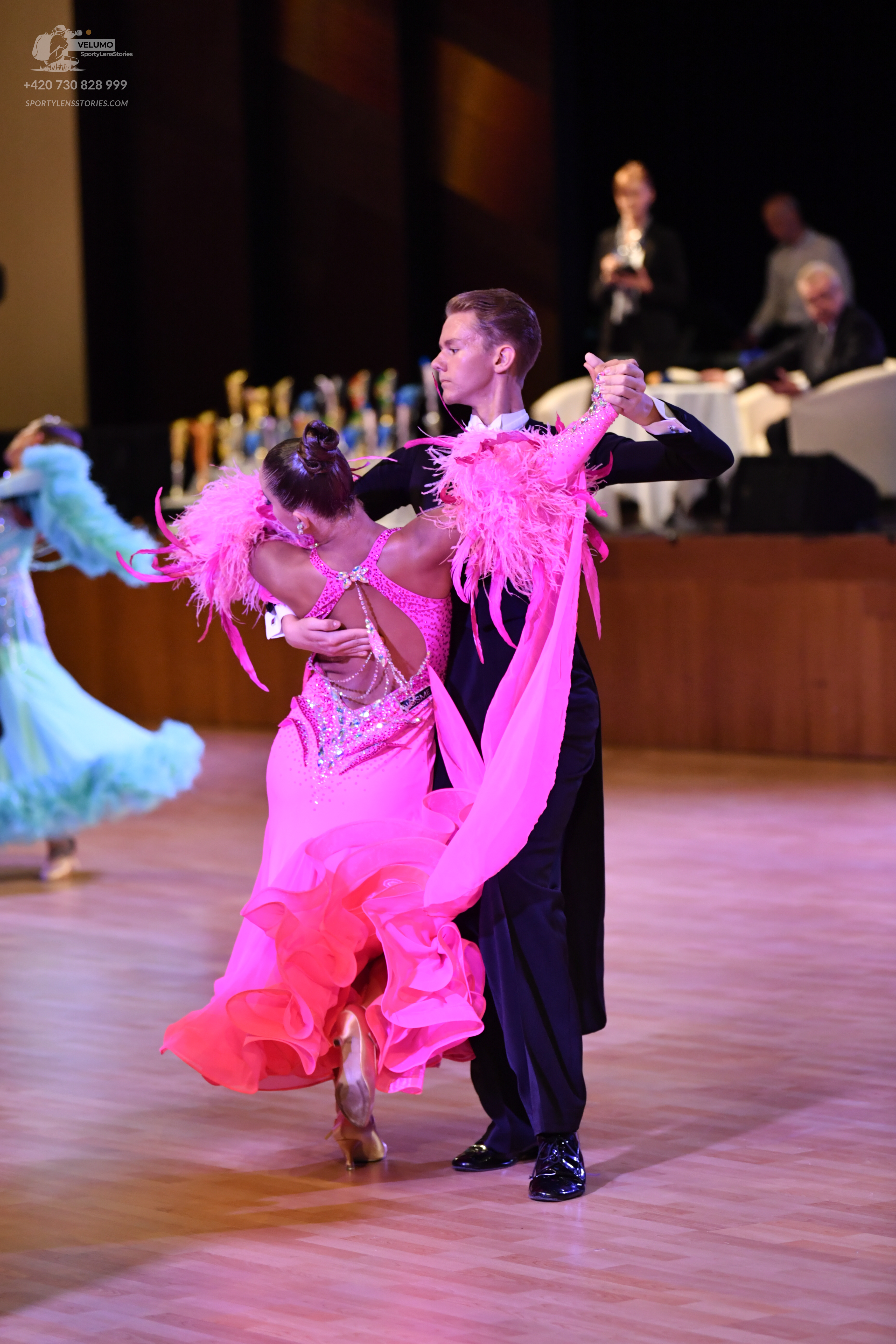 Dancesport competitor: ** Black tailsuit