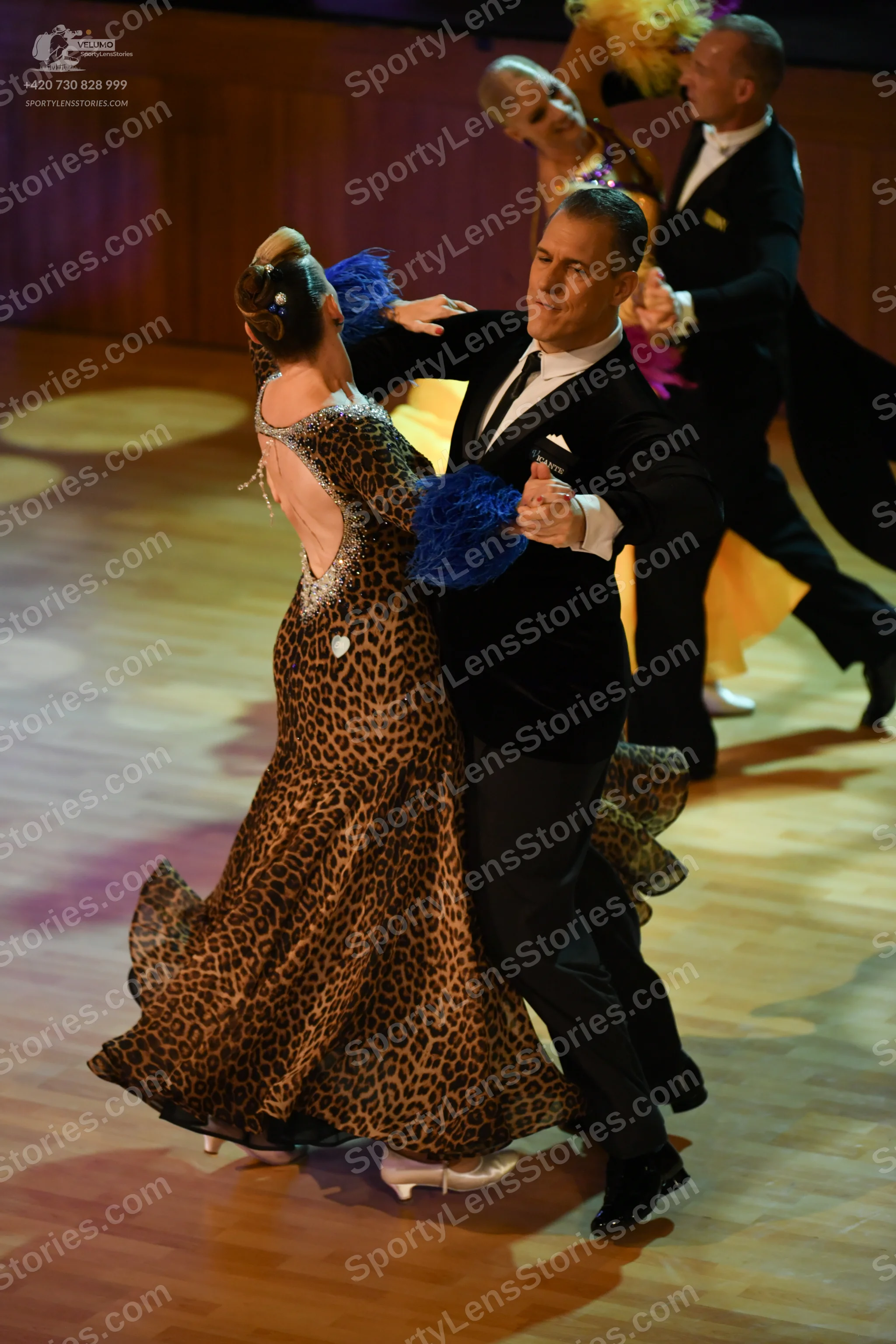 Dancesport competitor: ** Black tail suit