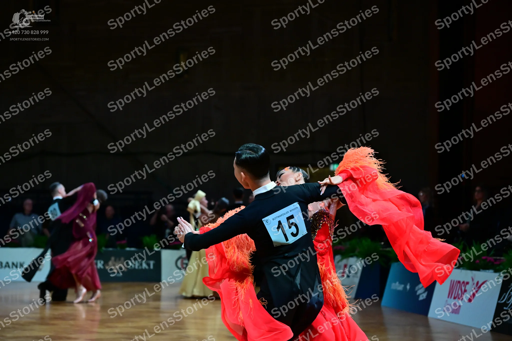 Dancesport competitor #15: Foreground male dancer: black long-sleeved shirt