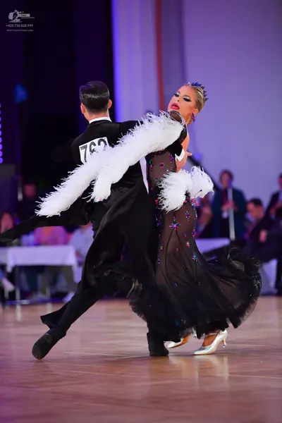 Dancesport competitor #762: Male dancer: black suit