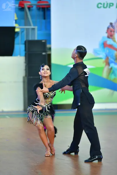 Dancesport competitor: ** Black Latin suit