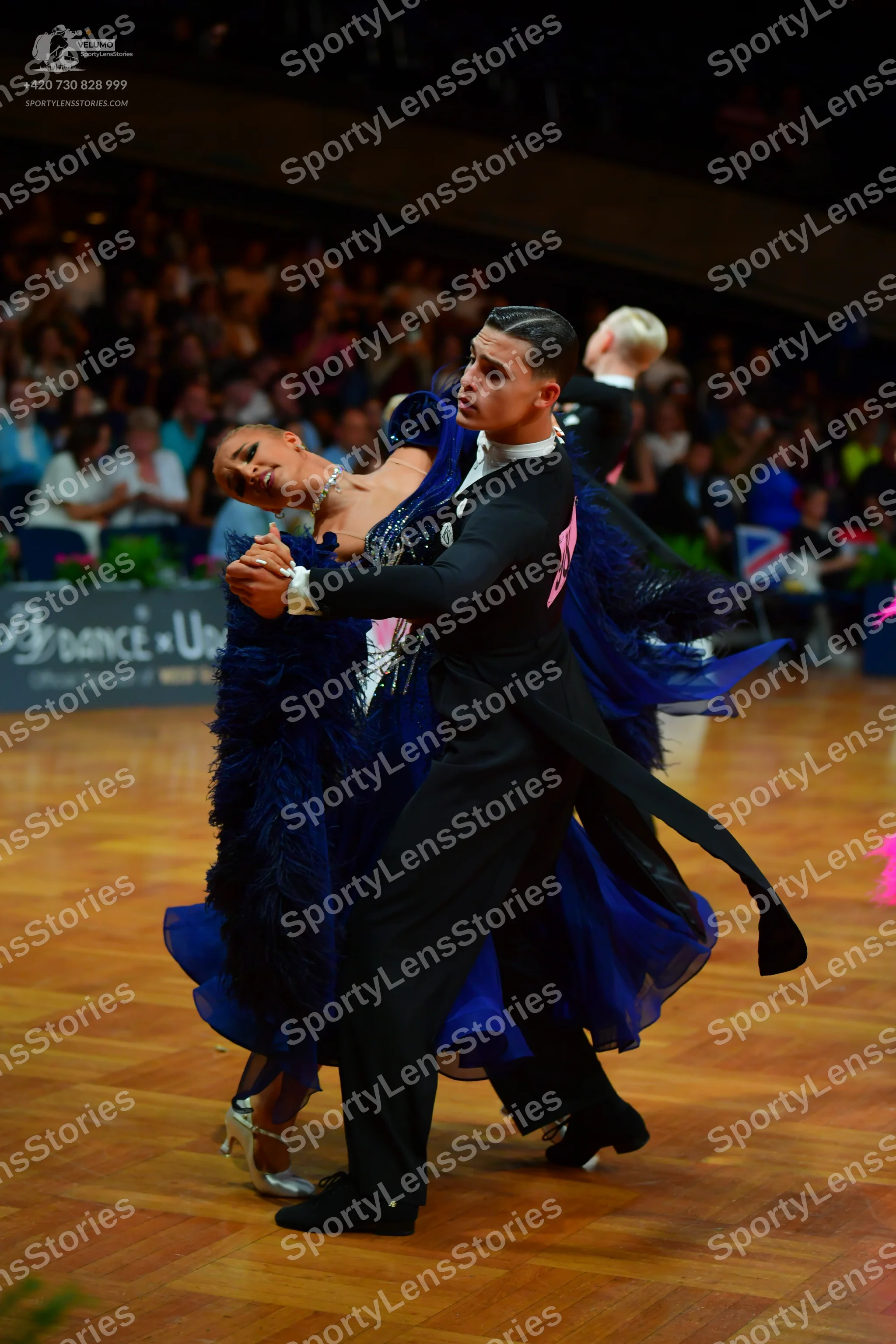 Dancesport competitor: Male dancer: black suit with black trousers and black shoes