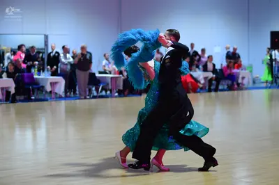 Dancesport competitor: Male dancer: black suit