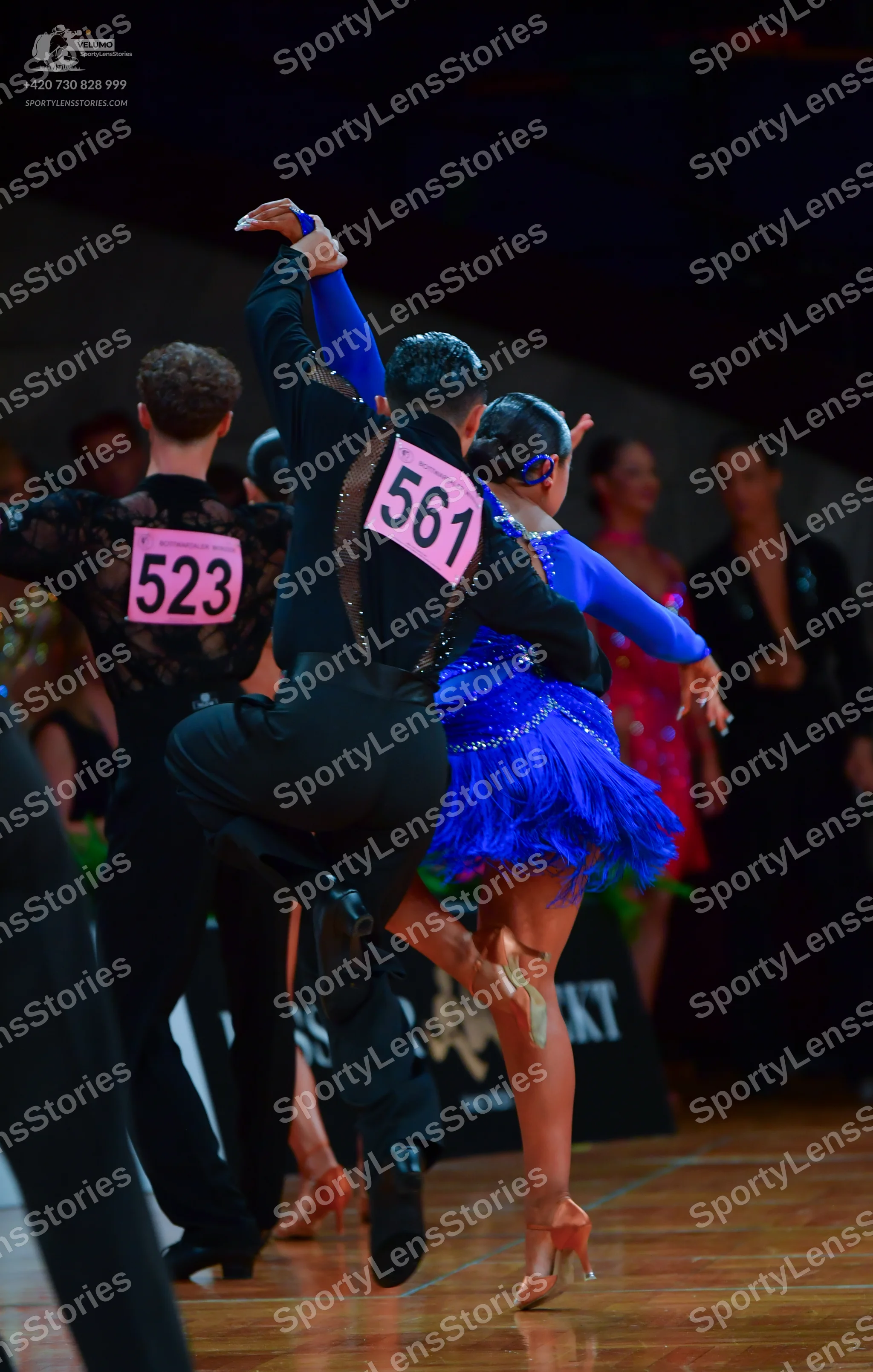 Dancesport competitor: Male dancer 523: black shirt with a lace pattern on the back and black trousers