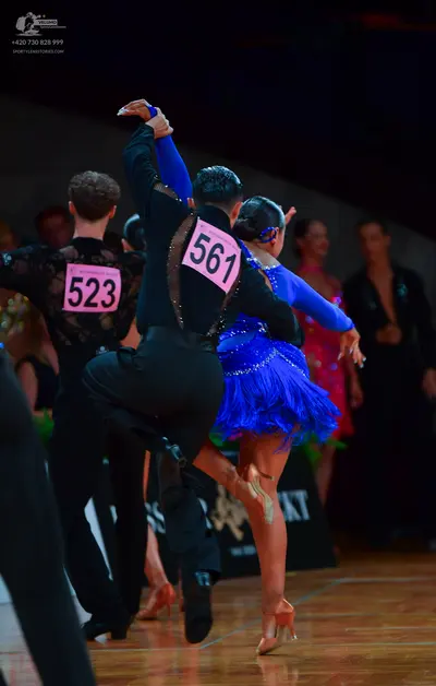 Dancesport competitor: Male dancer 523: black shirt with a lace pattern on the back and black trousers