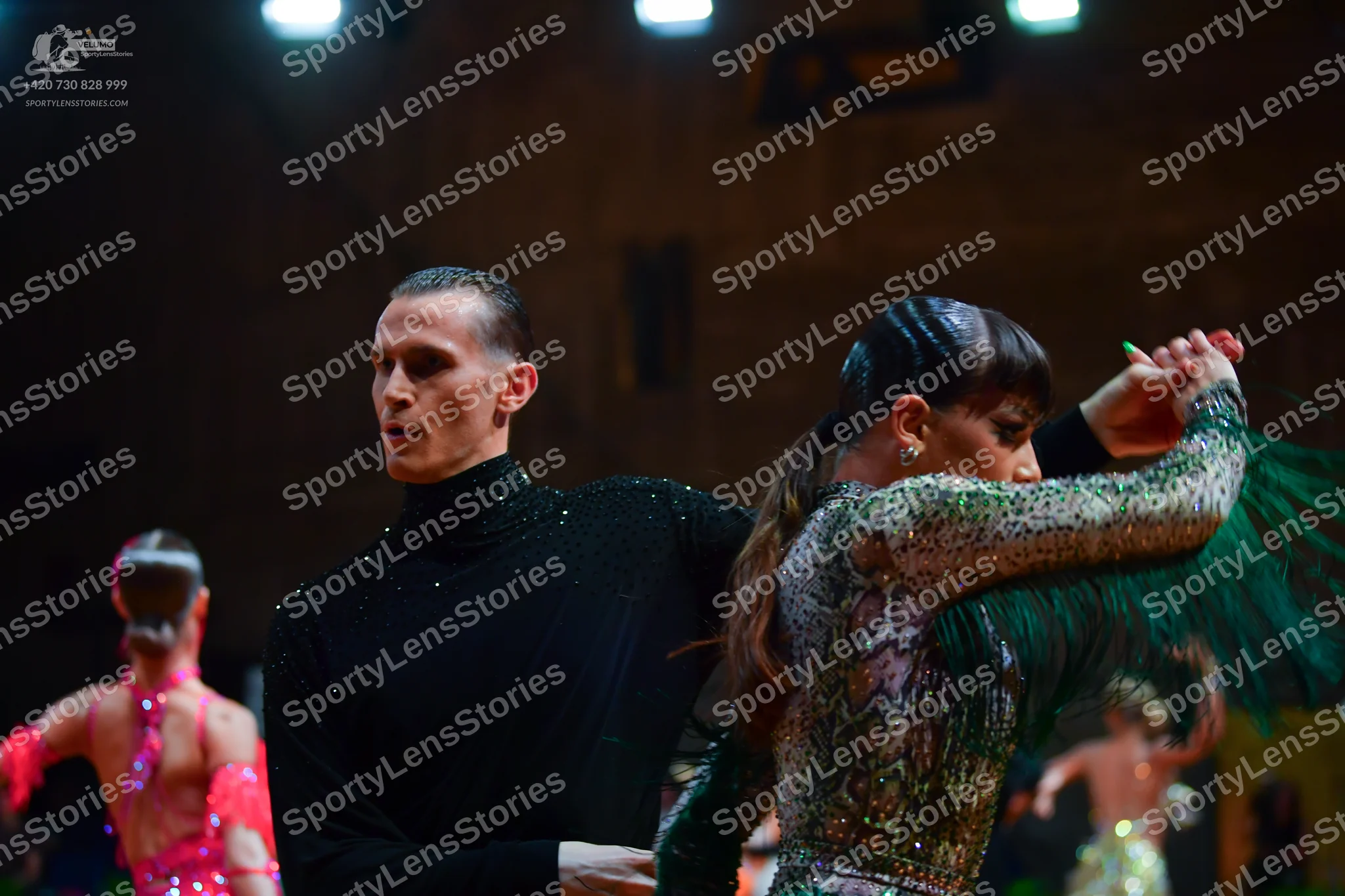 Dancesport competitor: Male dancer: black long-sleeve turtleneck