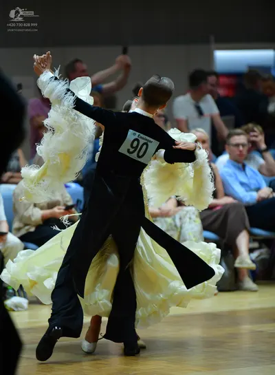 Dancesport competitor #90: Male dancer: black long-sleeved shirt and black trousers