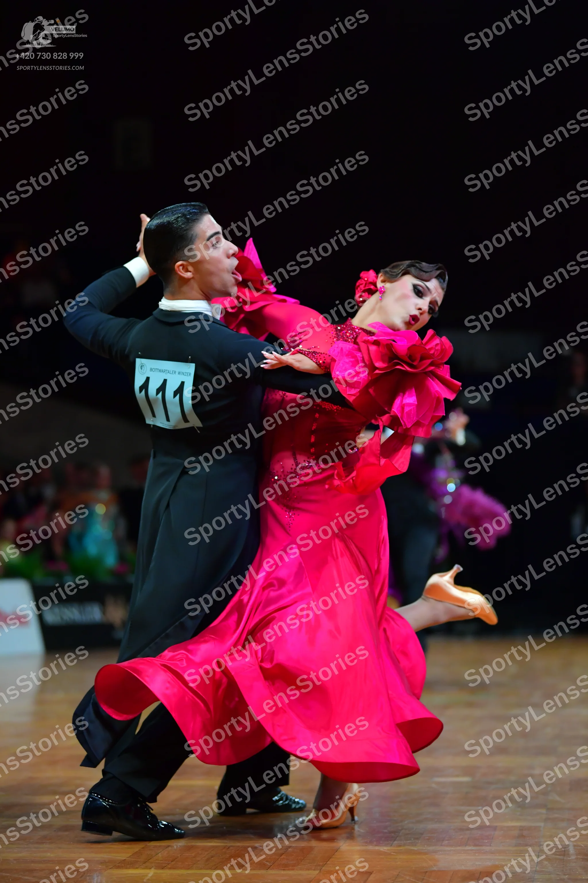 Dancesport competitor #111: Male dancer: black long-sleeved shirt and black trousers with black dance shoes
