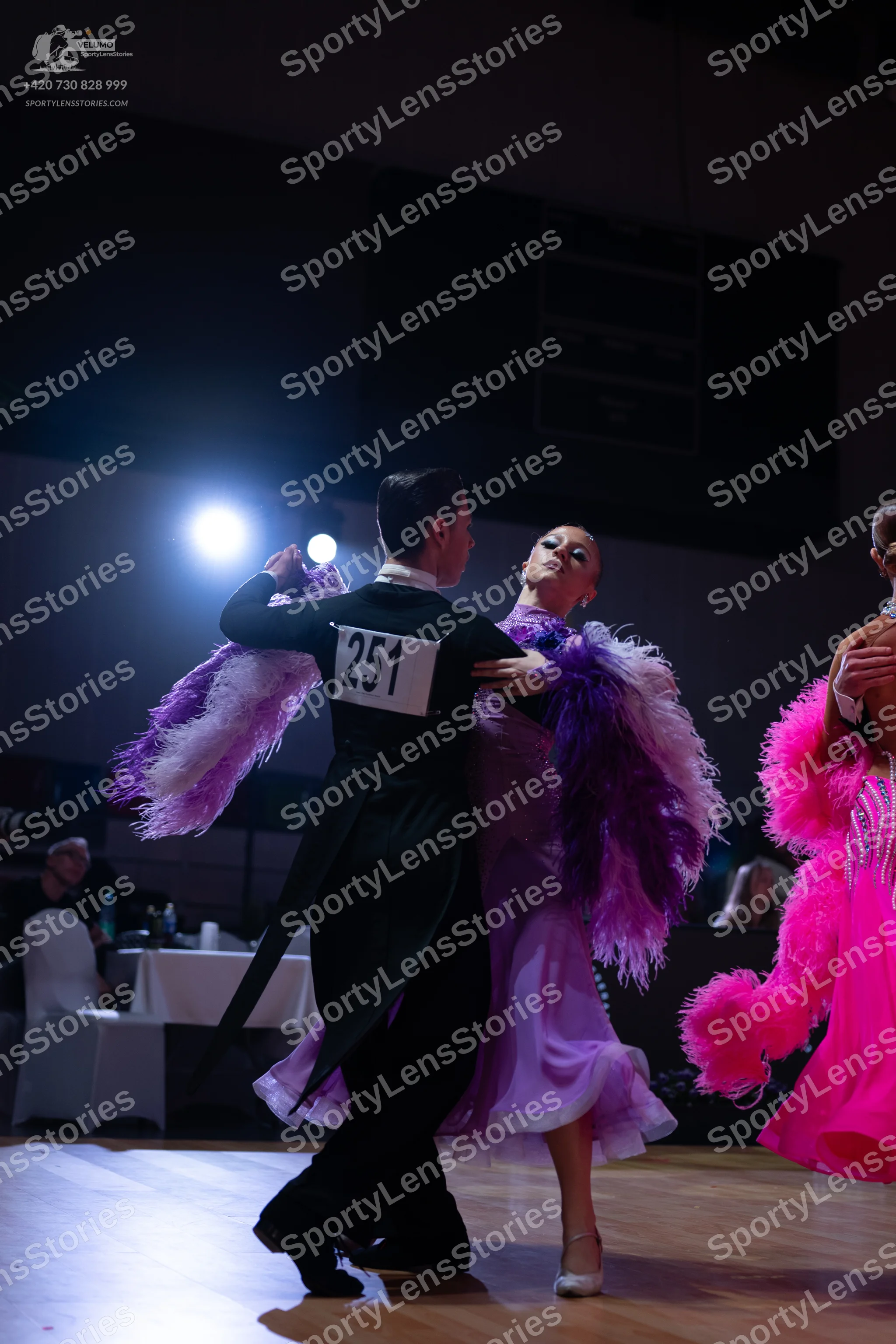 Dancesport competitor: Male dancer: black tailcoat suit