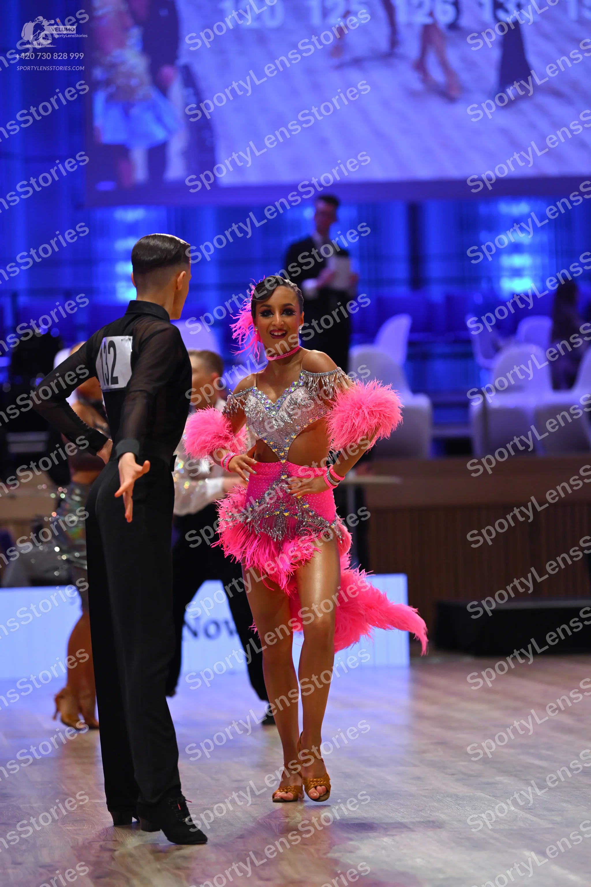 Dancesport competitor: Male dancer: black long-sleeved shirt and black trousers
