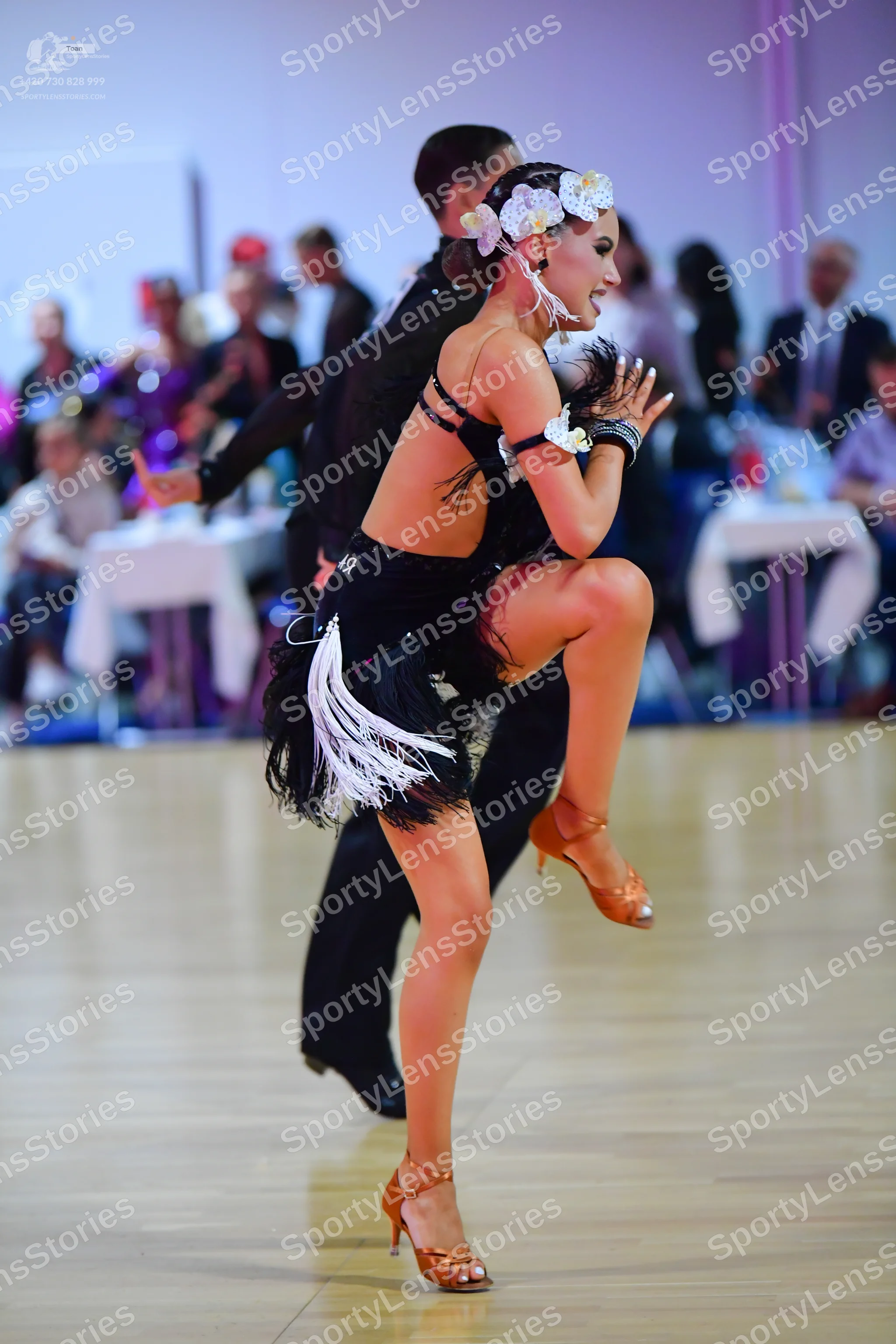 Dancesport competitor: Male dancer: black long-sleeved shirt and black trousers