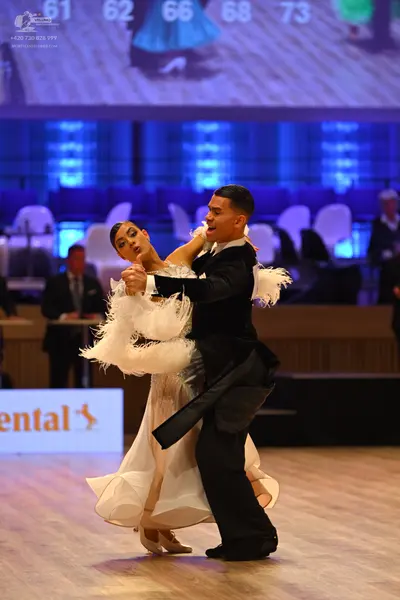 Dancesport competitor: Male dancer: black suit