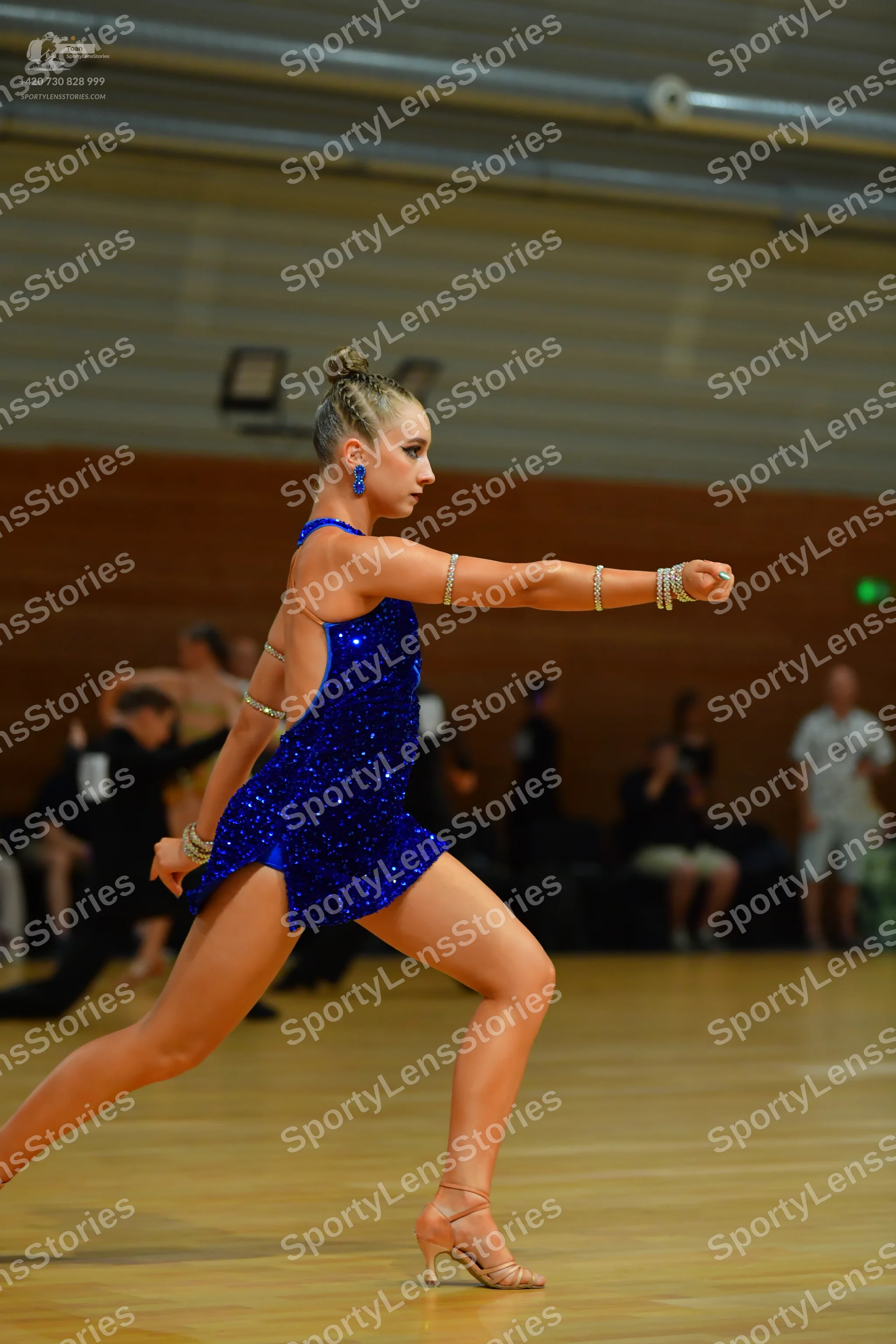Dancesport competitor: ** Blue sequin bodycon dress
