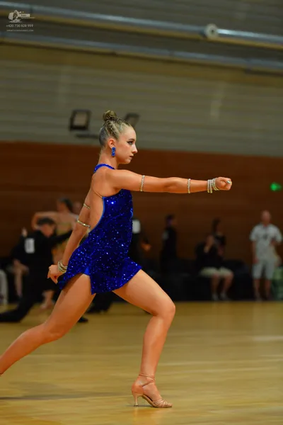 Dancesport competitor: ** Blue sequin bodycon dress