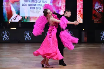 Dancesport competitor: Male dancer: black suit