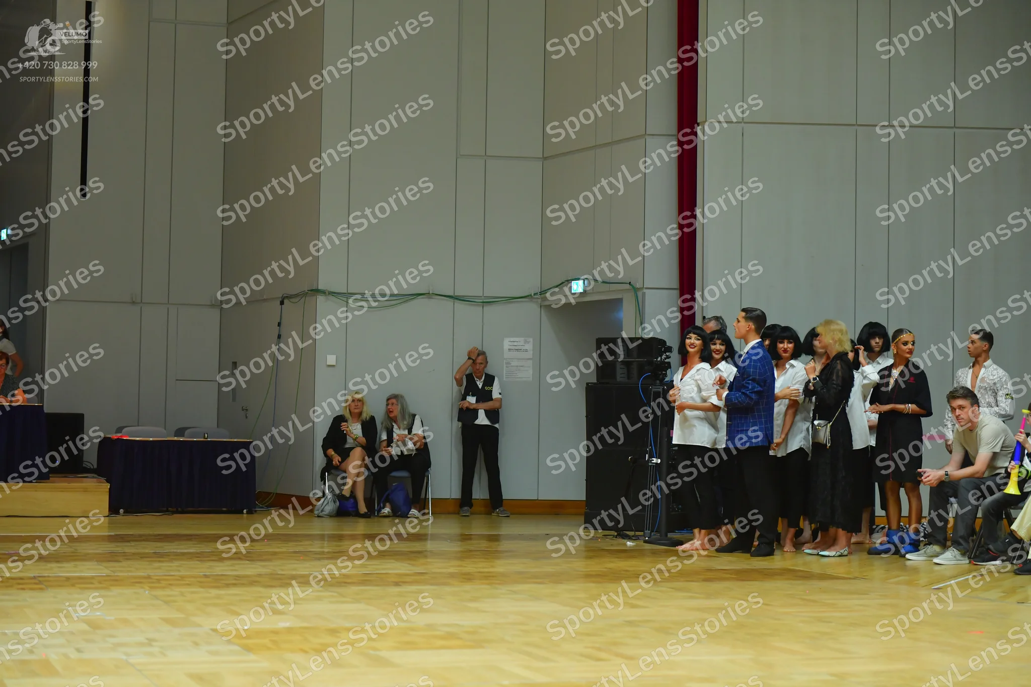 Dancesport competitor: No dancers in competition costumes are visible
