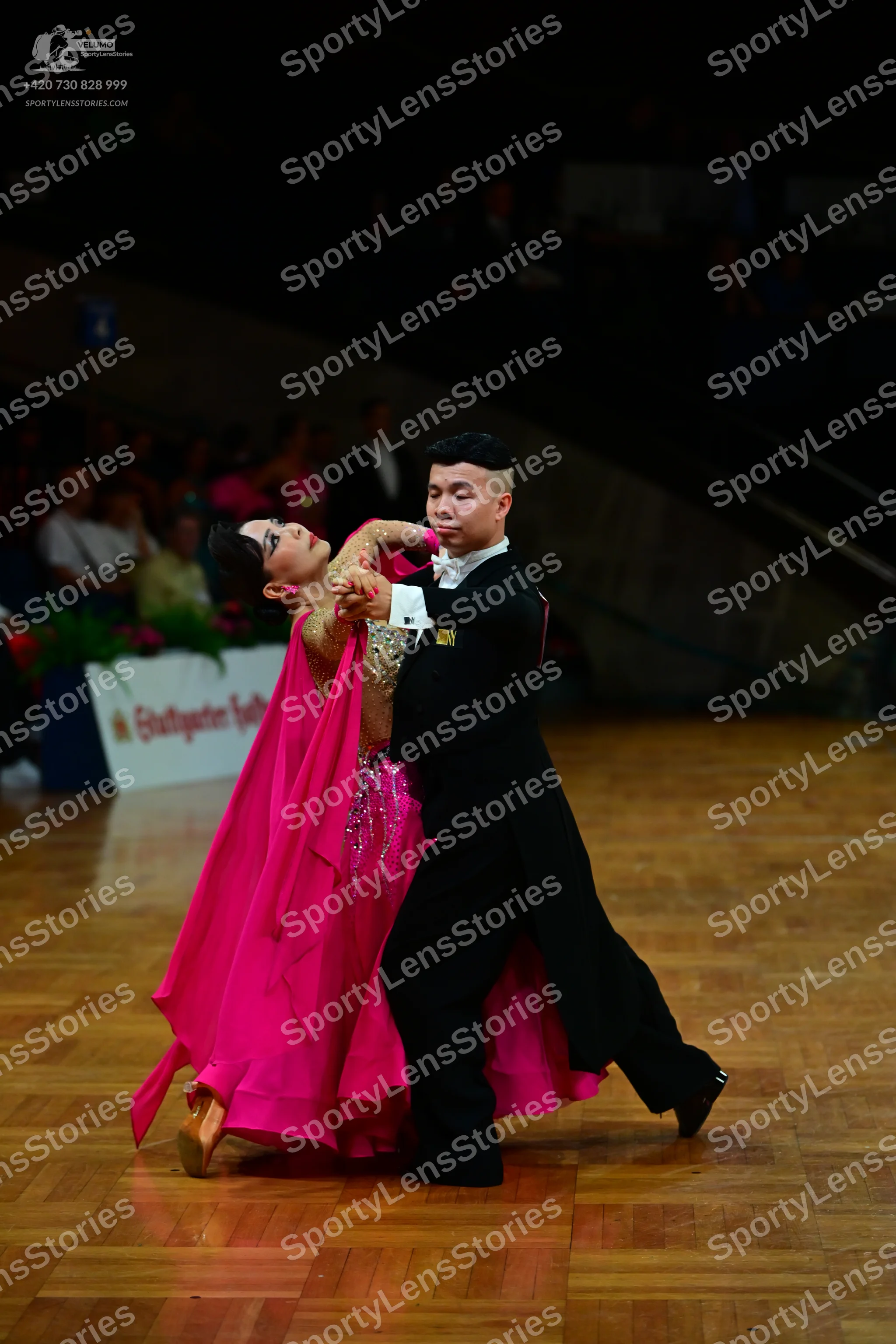 Dancesport competitor: Male dancer: black ballroom suit with black trousers and black shoes