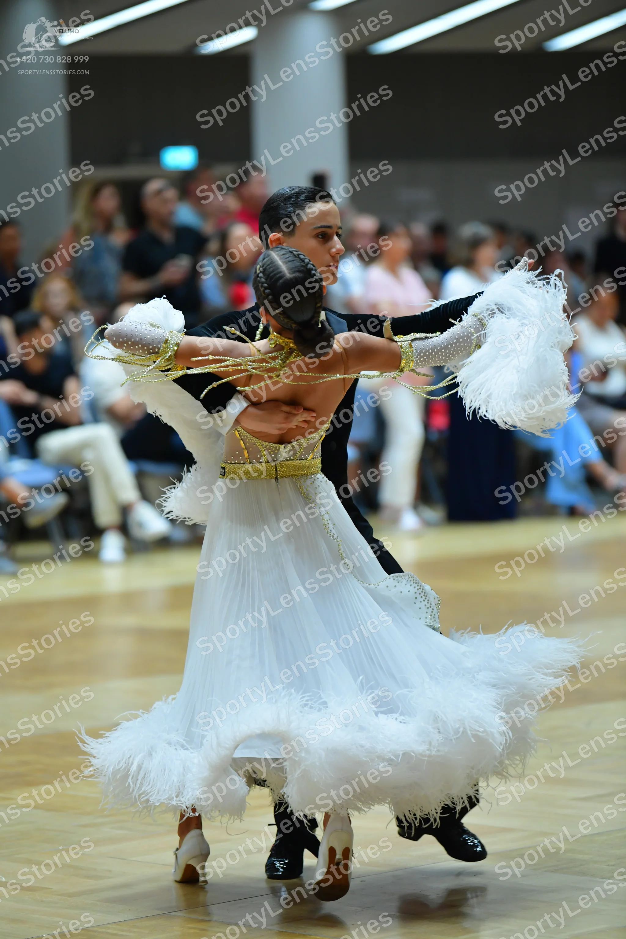 Dancesport competitor: Male dancer: black ballroom suit