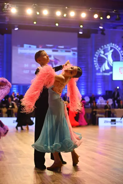 Dancesport competitor: Male dancer: black suit