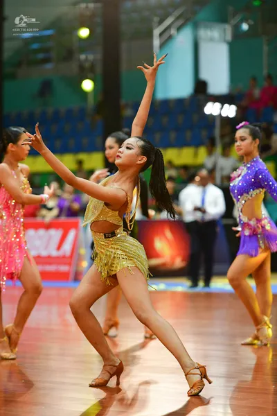 Dancesport competitor: Male**
*   **Color:** Black
*   **Fabric:** Primarily sequins, with what appears