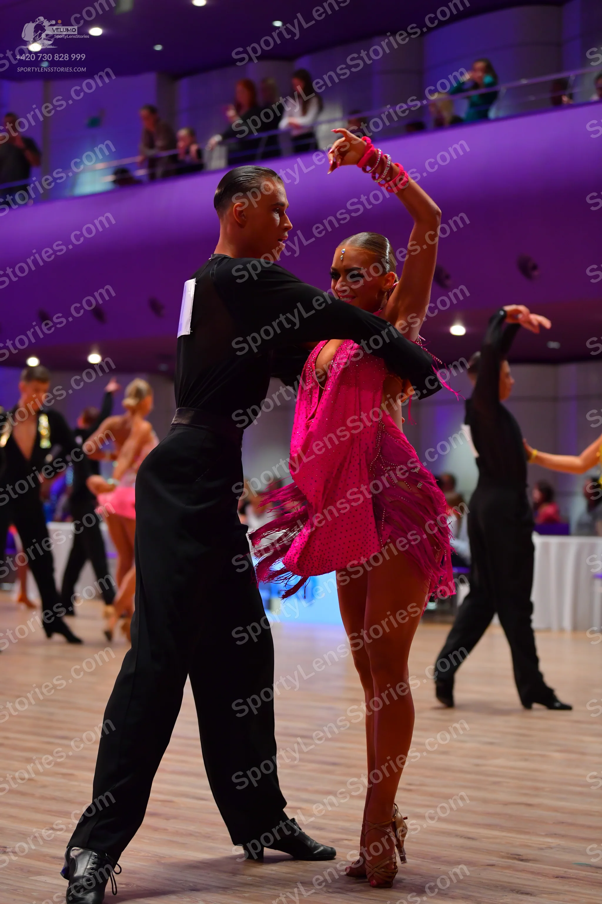Dancesport competitor: Main male dancer: black long-sleeved shirt and black trousers