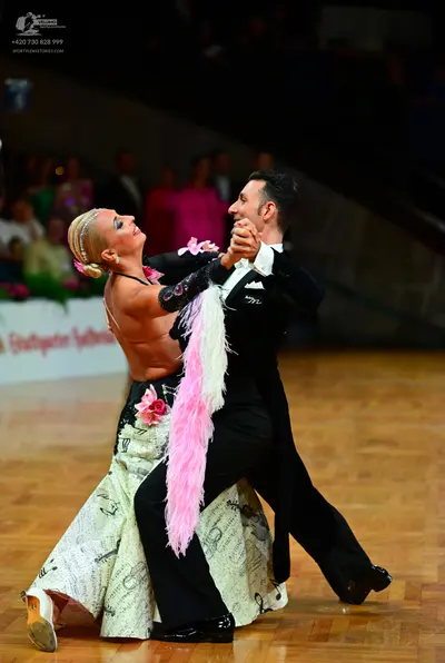 Dancesport competitor: Male dancer: black suit
