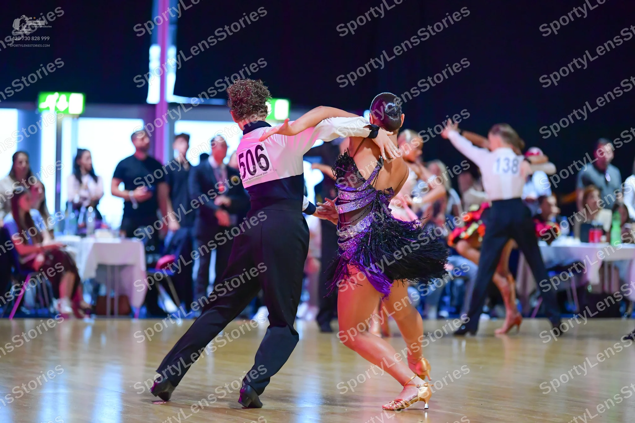 Dancesport competitor #506, #138: Male dancer (506): white long-sleeved shirt and black trousers