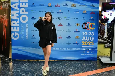 Dancesport competitor: Female dancer: red latin dress