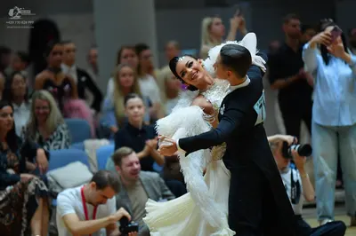 Dancesport competitor: Male dancer: black suit