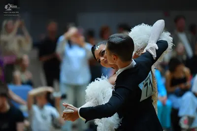 Dancesport competitor #71: Male dancer: black long-sleeved top