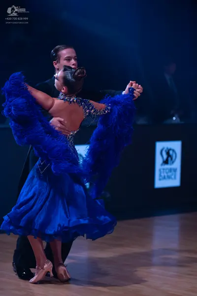 Dancesport competitor: Male dancer: black suit